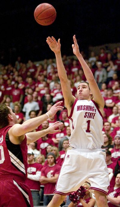 WSU’s Klay Thompson hits a 3 over Stanford’s Drew Shiller. (Associated Press / The Spokesman-Review)