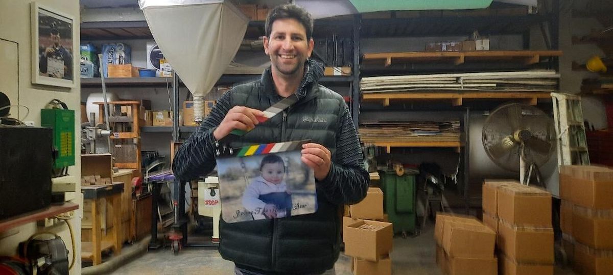 Daniel Seddiqui  with the Hollywood clapperboard in Los Angeles.   (Courtesy Daniel Seddiqui )