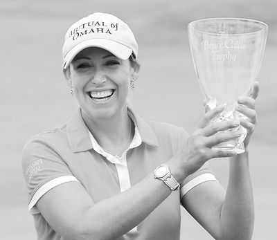 Cristie Kerr celebrates with the Bruce Callis Trophy after winning the final round of the LPGA State Farm Classic golf tournament.  (Associated Press)