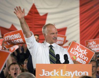 In this Sept. 28, 2008 photo, federal NDP Leader Jack Layton waves to supporters at the end of his speech, in Toronto. Layton died Monday, Aug. 22, 2011, after a battle with cancer. (Jacques Boissinot / The Canadian Press)