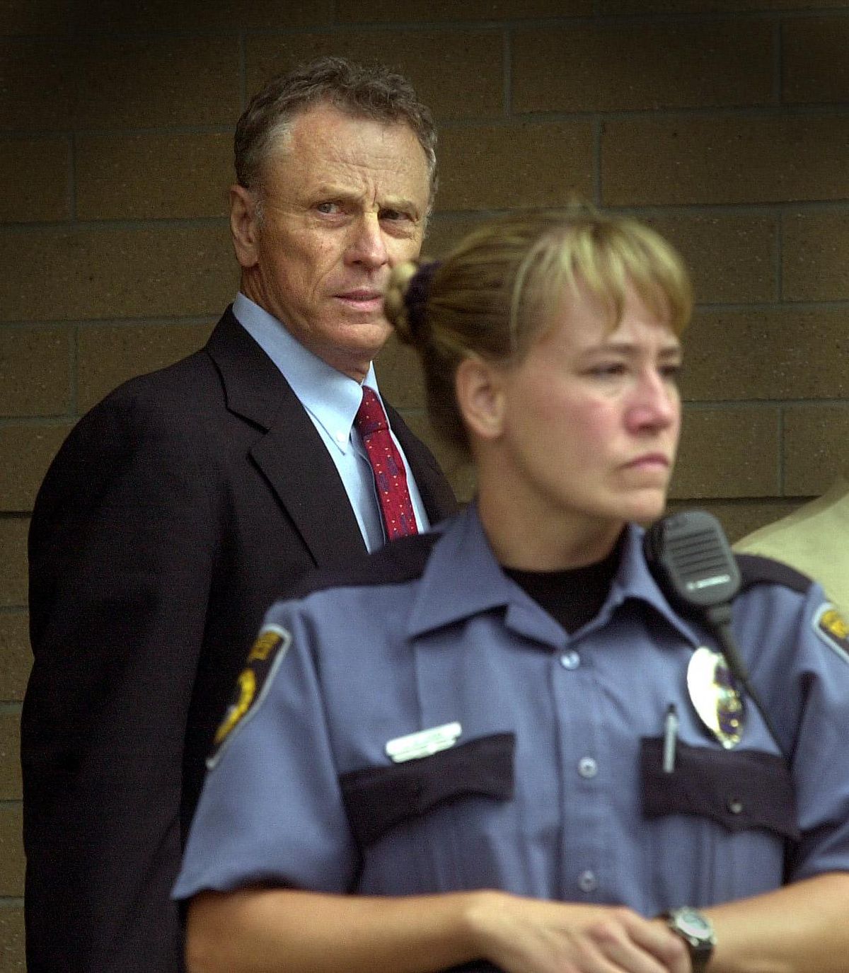 Morris Dees exits the Kootenai County Courthouse after the first day of trial in 2000. Dees represented two people chased and assaulted by the Aryan Nations. (Brian Plonka / The Spokesman-Review)