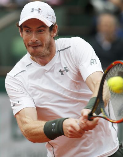 Britain's Andy Murray returns the ball during his quarterfinal match. (Michel Euler / Associated Press)
