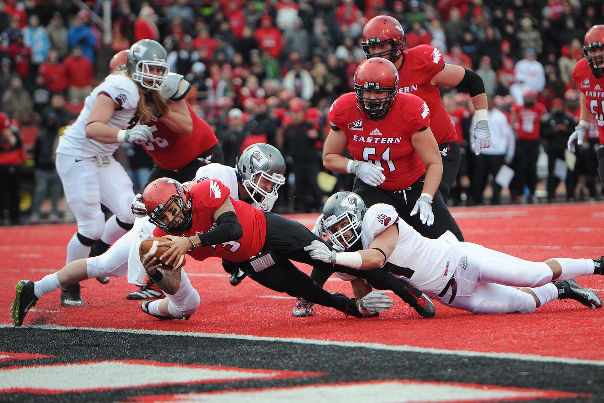Eastern Washingon quarterback Vernon Adams Jr. scores on a 3-yard run with 9 seconds left in the first half to cap an 81-yard drive. (Tyler Tjomsland)