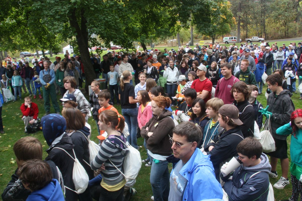 More than 800 people braved cloudy skies to do their part to make the Spokane River and surrounding riverbanks a little cleaner. (Stephen F. Dawson III)