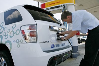 Tom Albert, of Alexandria, Va., fuels his Chevrolet Equinox electric fuel cell vehicle at a Shell hydrogen station in June  in Washington, D.C. Albert was participating in “Project Driveway,” which lets customers provide feedback on vehicles.    (Associated Press / The Spokesman-Review)