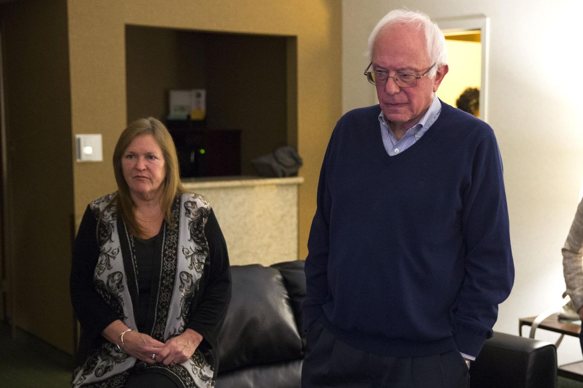 Jane Sanders and her husband Democratic presidential candidate Sen. Bernie Sanders, I-Vt., watch caucus returns in his hotel room, on Monday, Feb. 1, 2016, in Des Moines, Iowa. (Evan Vucci / AP)