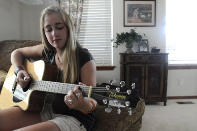 Jillian Grutta, 15, of Coeur d’Alene, is going to Grammy Camp, a summer program for young singers like Grutta, who also writes her own songs.  (Jesse Tinsley / The Spokesman-Review)