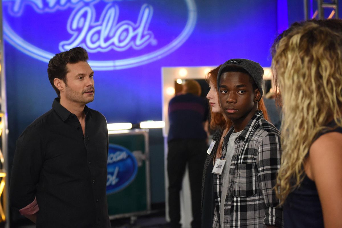 Ryan Seacrest with contestants in the “Hollywood Round No.2” episode of “American Idol.” (Michael Becker / Fox)