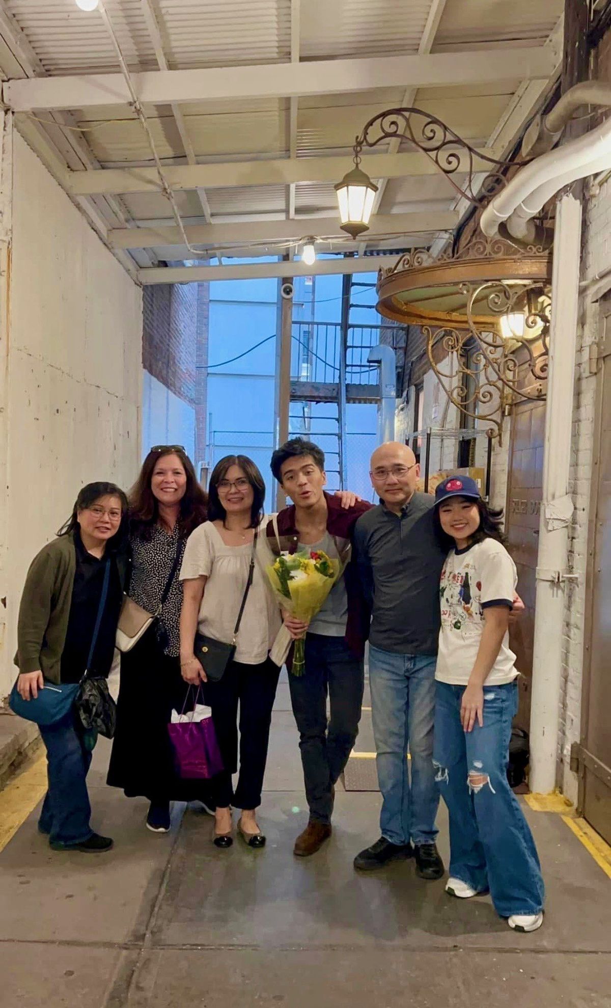 Christopher Tamayo, center, is surrounded left to right by aunt Christine Cuenco, Spokane Valley Summer Theatre founder Yvonne Johnson, mother Jessica Tamayo, friend Sean Shen and Helen Shen, actress in “Maybe Happy Ending.”  (Courtesy)