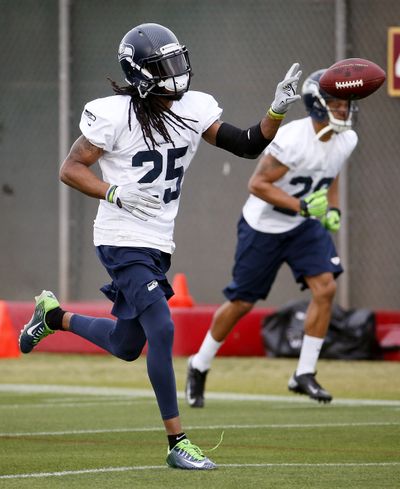 Seattle Seahawks' Richard Sherman runs through drills during a team practice on Wednesday. (AP)