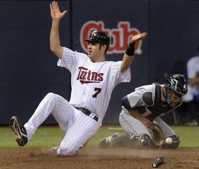Minnesota Twins catcher Joe Mauer (7) can become a free agent after the 2010 season.  (Associated Press)