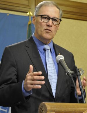 OLYMPIA -- Gov. Jay Inslee explains some of the things he wants, and doesn't want, the Legislature to do in an upcoming special session on April 23, 2015. (Jim Camden/Spokesman-Review)