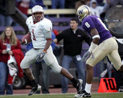 
Washington State running back Jerome Harrison, left, leads the nation in rushing yards and is second in all-purpose yards. 
 (Associated Press / The Spokesman-Review)