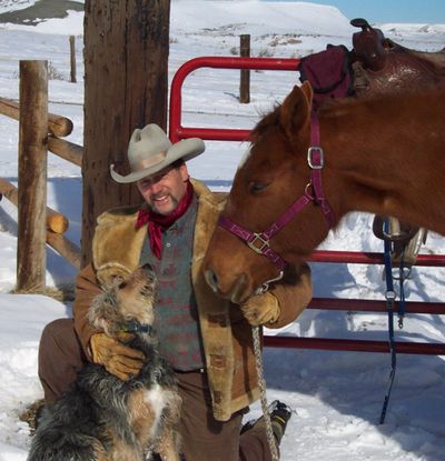 ORG XMIT: FX101 In this photo provided by the subject and taken in Dec. of 2006, Gary Strader is seen with his dog and horse in Glendive, Montana. Strader, a former professional hunter for the U.S. government claims in a whistleblower complaint he was fired in retaliation for reporting that two co-workers illegally shot two mountain lions from an airplane in northeast Nevada.  (AP Photo/Gary Strader) ** NO SALES ** (Gary Strader / The Spokesman-Review)