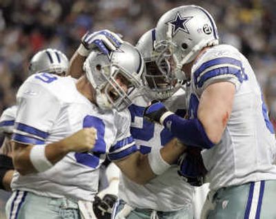 
Dallas QB Tony Romo (left) and RB Marion Barber (center) are NFC reserves, while TE Jason Witten (right) will start.Associated Press
 (Associated Press / The Spokesman-Review)