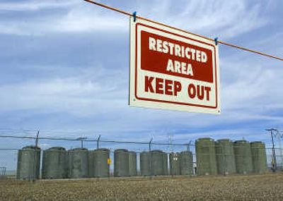 
Spent fuel rods are stored in protected containers at the Columbia Generating Plant on the Hanford Nuclear Reservation. The Energy Department has reduced pay to a cleanup contractor, citing failures. 
 (File / The Spokesman-Review)