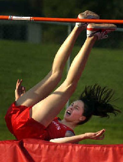 
Ferris sophomore Kelly McNamee breaks the 20-year-old school record with a 5-foot-7 high jump. 
 (Jed Conklin / The Spokesman-Review)