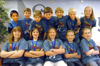 Skyway Elementary students (from left, front row) Kelly Cutler, Cherice Speer, Taylor Hanzen, Isaac Cunnington, Maddi Jessick, (back row, from left) Ethan Leyva, Chris Frasier, Alec Baird, Riley Moreen, Kole Smith, Jacob Cunnington and Ashley Lennon hope to go to the national  Destination ImagiNation tournament in Tennessee.  
 (Jesse Tinsley / The Spokesman-Review)