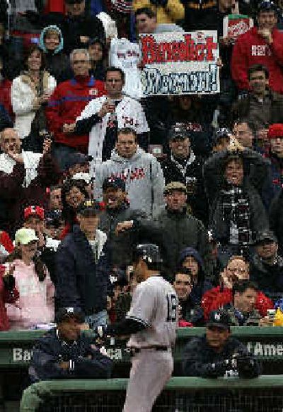 
Red Sox fans serenade former favorite Johnny Damon as he returns to Yankees dugout in first inning. 
 (Associated Press / The Spokesman-Review)