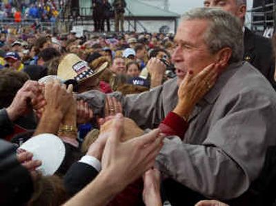 
President Bush is mobbed as he greets supporters following a rally at Hersheypark Stadium, Thursday in Hershey, Pa. President Bush is mobbed as he greets supporters following a rally at Hersheypark Stadium, Thursday in Hershey, Pa. 
 (Associated Press Associated Press / The Spokesman-Review)