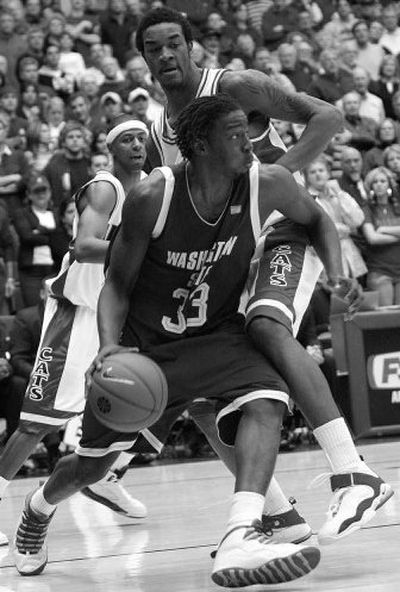 Washington State's Ivory Clark has been an offensive force in a variety of ways during his satisfying senior season.
(Associated Press / The Spokesman-Review)