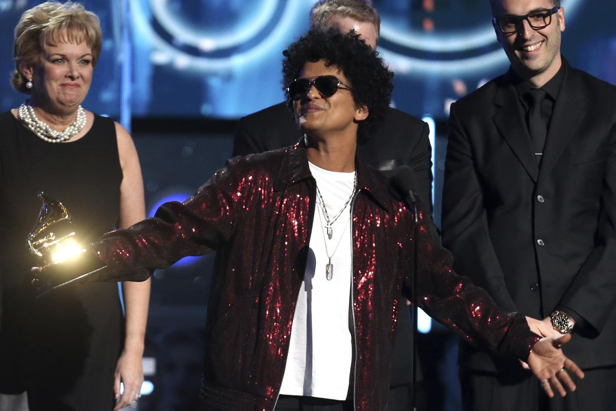Bruno Mars accepts the award for record of the year for "24K Magic" at the 60th annual Grammy Awards at Madison Square Garden on Sunday, Jan. 28, 2018, in New York. (Matt Sayles / Associated Press)