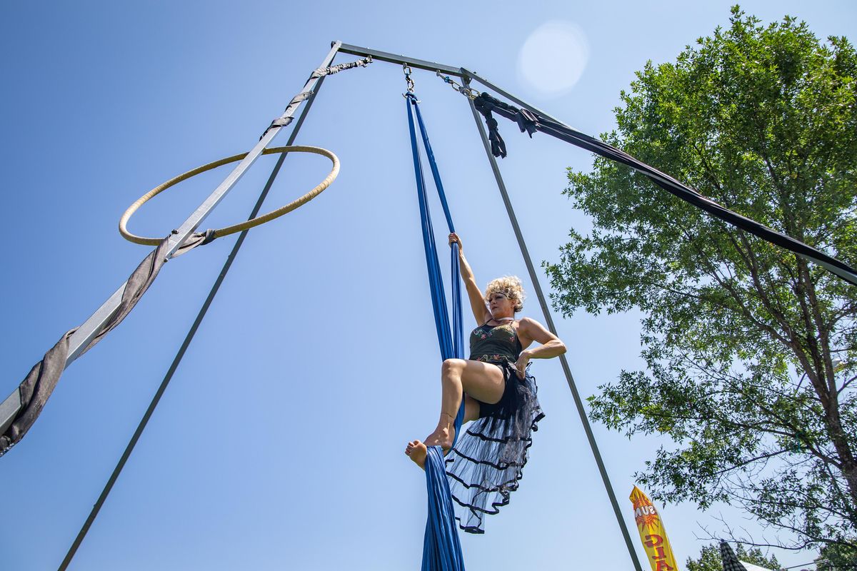 Happi Jones of Spokane Aerial Performance Arts performs during the final day of the 2019 Hillyard Festival at Hillyard Skate Park on Aug. 4, 2019. Family-friendly fun on Sunday included the Roll “N” Hillyard car show, vendors, nondenominational worship, booths and games. (Libby Kamrowski / The Spokesman-Review)