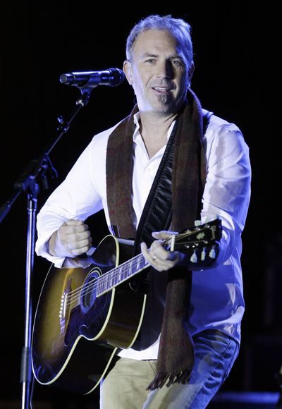 Kevin Costner performs with his band Modern West at a free concert in Nashville, Tenn. Costner and Modern West have released their debut CD, “Untold Truths.”  (Associated Press / The Spokesman-Review)