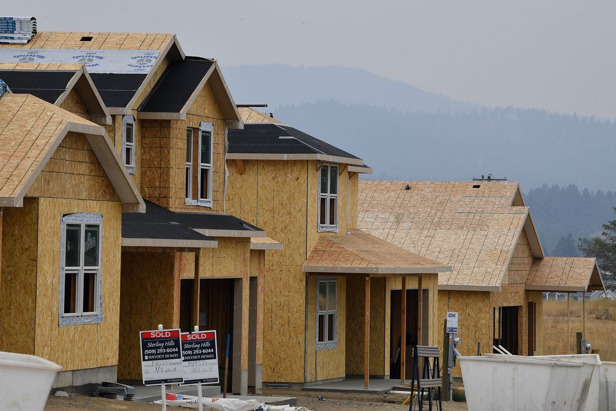 A group of houses being built by Hayden Homes are shown on Sept. 10 in Spokane Valley. A group of real estate consultants released a report Monday that provides solutions to meet housing demand in Spokane County.  (TYLER TJOMSLAND/THE SPOKESMAN-REVIEW)