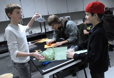 Central Valley freshmen Hayden Lanning, left,  and Cody Patton  discuss the design of the “Mars Lander” they’re building with Chase Cramer-Meads, center,  in Krista Larsen’s science class Wednesday at Central Valley High School.  (J. BART RAYNIAK / The Spokesman-Review)