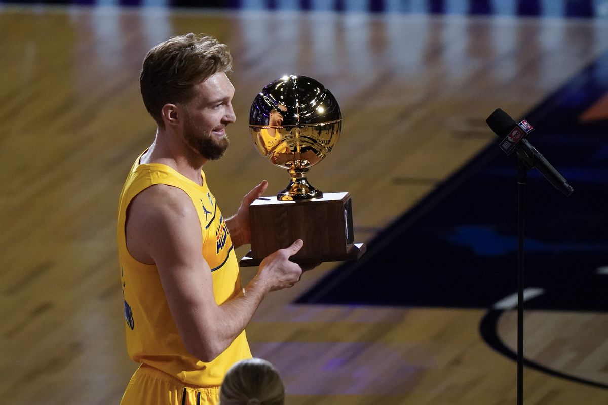 Indiana Pacers forward Domantas Sabonis holds the trophy after winning the skills challenge portion of basketball