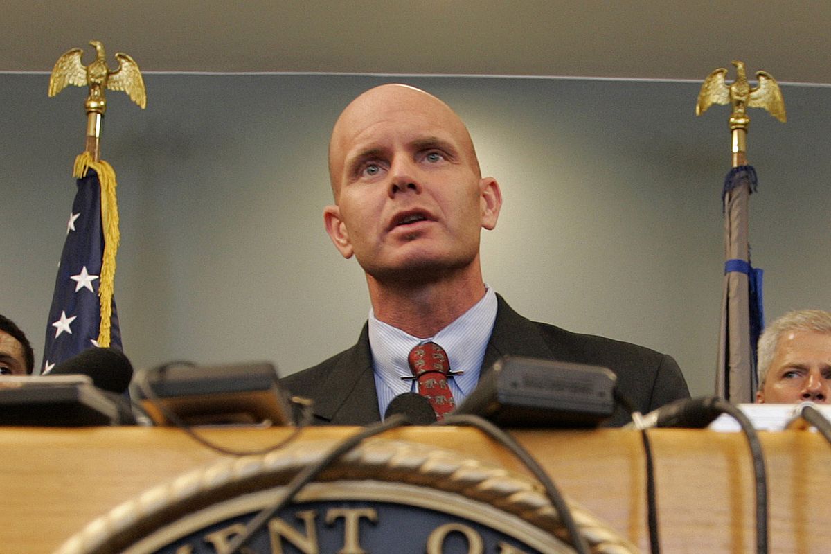 In this July 27, 2005 photo, FBI Agent Frederick Humphries speaks during a news conference after the sentencing of Ahmed Ressam at the Federal Courthouse in Seattle. Humphries has been identified as the agent socialite Jill Kelley contacted to complain about harassing emails sent by Gen. David Petraeus