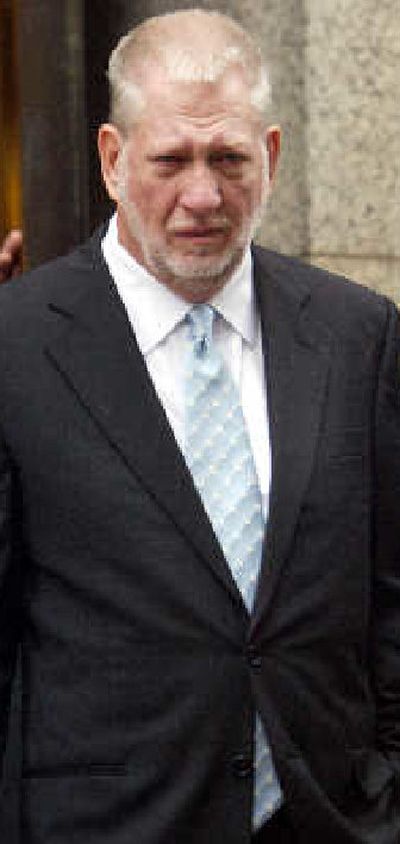 
Ex-CEO of WorldCom Bernard Ebbers leaves court after being sentenced.
 (Associated Press / The Spokesman-Review)