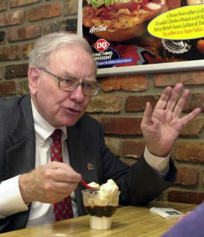 
Investor Warren Buffett has a snack at a Dairy Queen in Omaha, Neb., in 2002. Associated Press
 (File Associated Press / The Spokesman-Review)