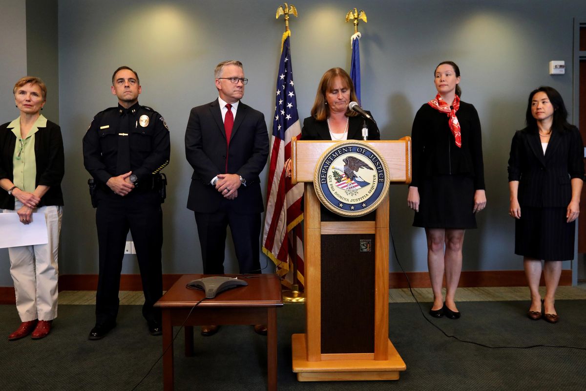 U.S. attorney Annette Hayes speaks at a news conference on cases filed alleging sexual assault on aircraft, at U.S. District Court in Seattle on Thursday, Aug. 30, 2018. Federal prosecutors have charged two men in separate cases with sexually assaulting women on commercial flights bound for Seattle - cases they hope will encourage victims and other passengers alike to report such attacks quickly. Mary Ellen Stone, with King County Sexual Assault Resource Center, from left, Deputy Chief Mike Villa, Jay Tabb, the special agent in charge of the FBI field office in Seattle, Assistant U.S. Attorneys Katheryn Frierson and Marie Dalton join the news conference. (Alan Berner / Associated Press)