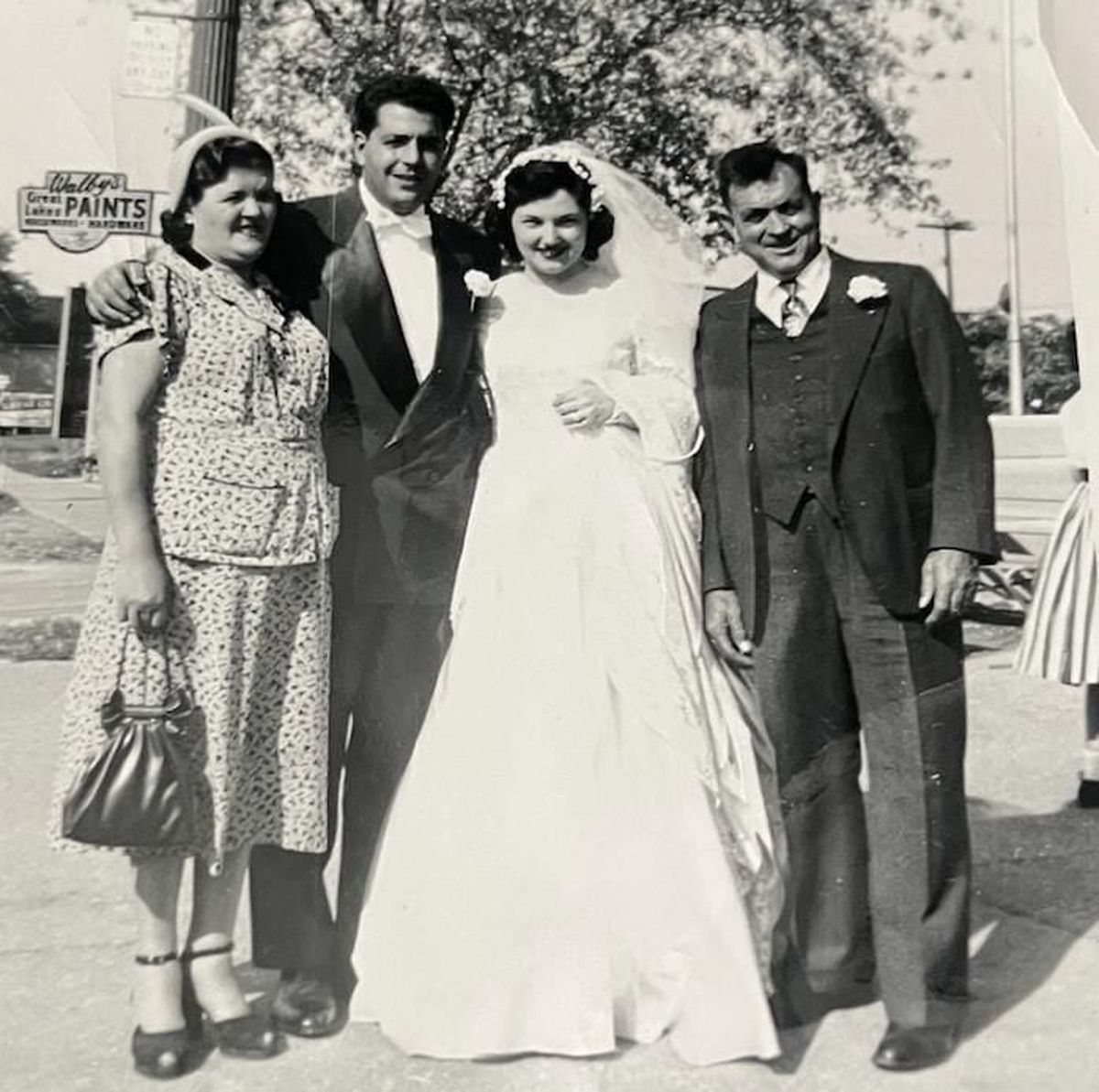 Frank and Josephine Ruggirello on their wedding day, Sept. 26, 1953, with Frank Ruggirello’s aunt and uncle. The photo was found in a donated book at Sterling Heights Public Library. 