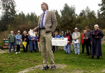 
Barry Rosenberg of the Kootenai Environmental Alliance speaks Wednesday morning at Tubbs Hill before an unusual coalition of environmentalists, builders and developers  opposed to Kootenai County's proposed subdivision and zoning rules.  
 (Jesse Tinsley / The Spokesman-Review)