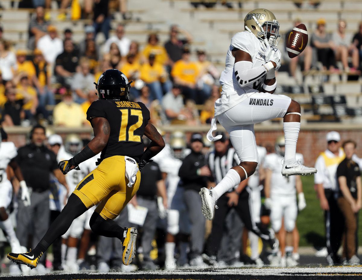 Idaho defensive back Armond Hawkins, right, defends a pass intended for Missouri wide receiver Johnathon Johnson (12) during the first half of an NCAA college football game Saturday, Oct. 21, 2017, in Columbia, Mo. (Jeff Roberson / Associated Press)