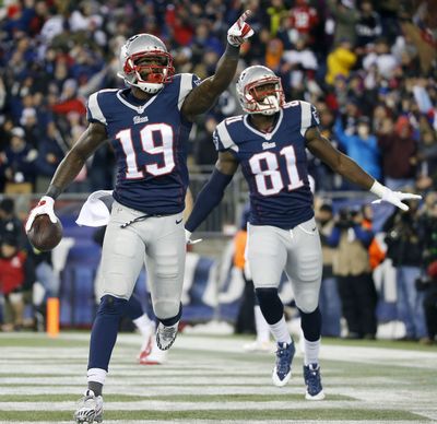 Patriots WR Brandon LaFell, left, celebrates TD catch with Timothy Wright. (Associated Press)