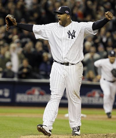 Yankees pitcher CC Sabathia threw his first postseason complete game in beating the Orioles on Friday. (Associated Press)
