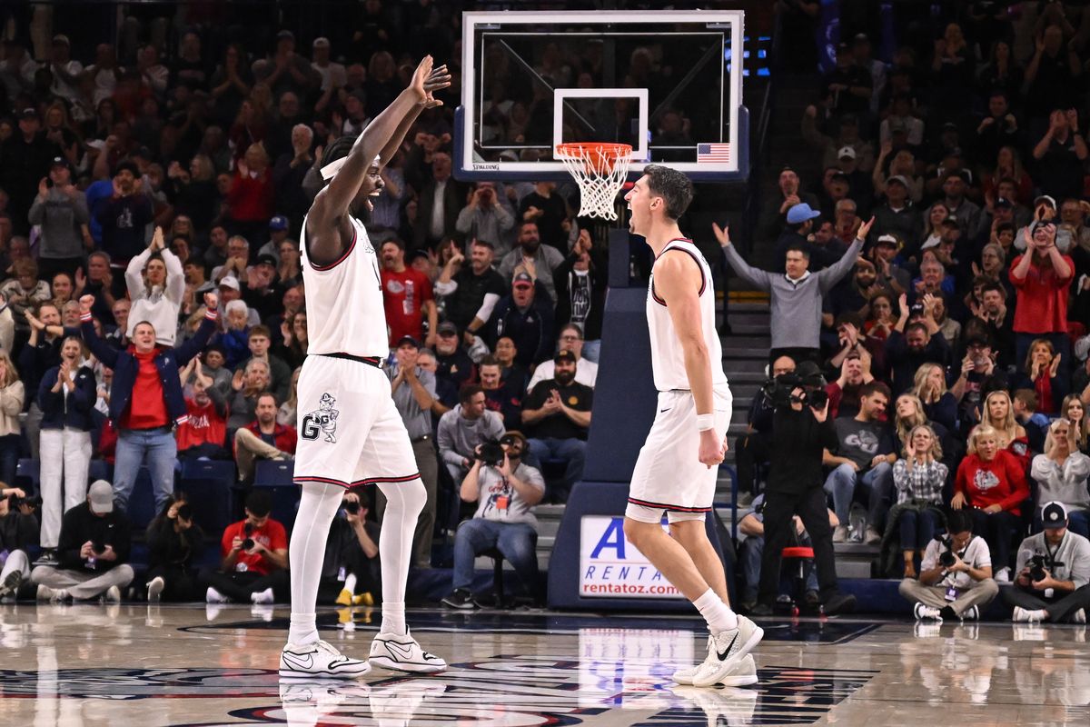 Gonzaga Bulldogs forward Graham Ike (15) and Gonzaga Bulldogs guard Steele Venters (2) celebrate after GU went on a scoring run against the Creighton Bluejays during the second half of a college basketball game on Tuesday, Nov 11, 2025, at McCarthey Athletic Center in Spokane, Wash. Gonzaga won the game 90-63.  (Tyler Tjomsland/The Spokesman-Review)