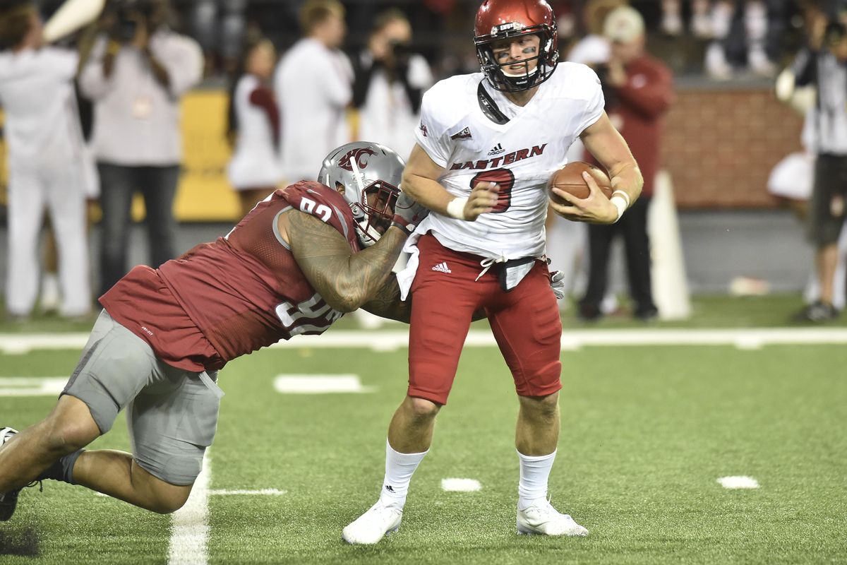 Robert Barber (92) sacks Eastern Washington quarterback Gage Gubrud (8) during both team’s 2016 season-opener. (Tyler Tjomsland / The Spokesman-Review)