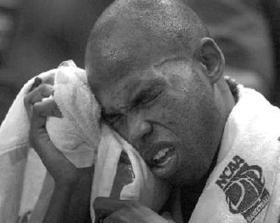 
USC's Taj Gibson ices face after taking an elbow. 
 (Dan Pelle / The Spokesman-Review)