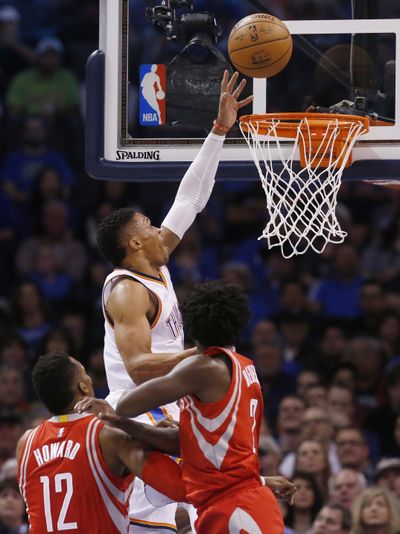 Oklahoma City Thunder guard Russell Westbrook registered his 25th career triple-double against the Houston Rockets. (Sue Ogrocki / Associated Press)