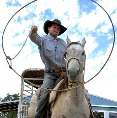 Robert Borba is being called a hero after chasing down an alleged bicycle thief with his horse, Long John, and nabbing him with a lasso in a Wal-Mart parking lot Friday in Eagle Point, Ore. (Denise Baratta / Associated Press)