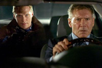 
Harrison Ford plays bank security expert Jack Stanfield, who is kidnapped by Bill Cox, played by Paul Bettany, left, in 