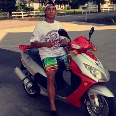 Reggie Nault, the 16YO Coeur d'Alene High baseball player who drowned in Lake Coeur d'Alene in July during an outing with friends, is shown on his motorcycle. (Reggie Nault/Facebook)