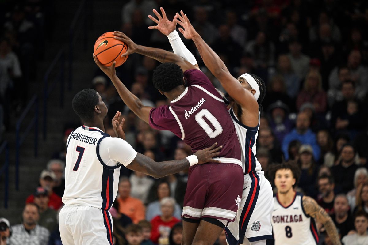 Gonzaga guard Tyon Grant-Foster, left, and guard Adam Miller defend Texas Southern guard Alex Anderson as he tries to pass during a nonconference game Monday in the McCarthey Athletic Center.  (COLIN MULVANY/THE SPOKESMAN-REVI)