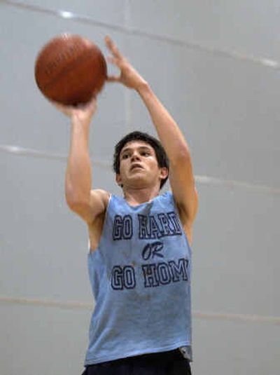 
Central Valley High's Braden Jensen practices his three-point shot during an after-school practice. Jensen is the team's co-captain and leading scorer. 
 (Liz Kishimoto / The Spokesman-Review)