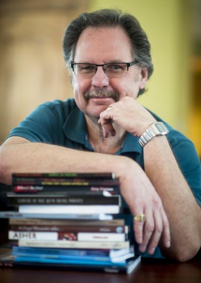 Russ Davis owns Gray Dog Press, which specializes in short-run, locally produced books of fiction and non-fiction. (Colin Mulvany / The Spokesman-Review)